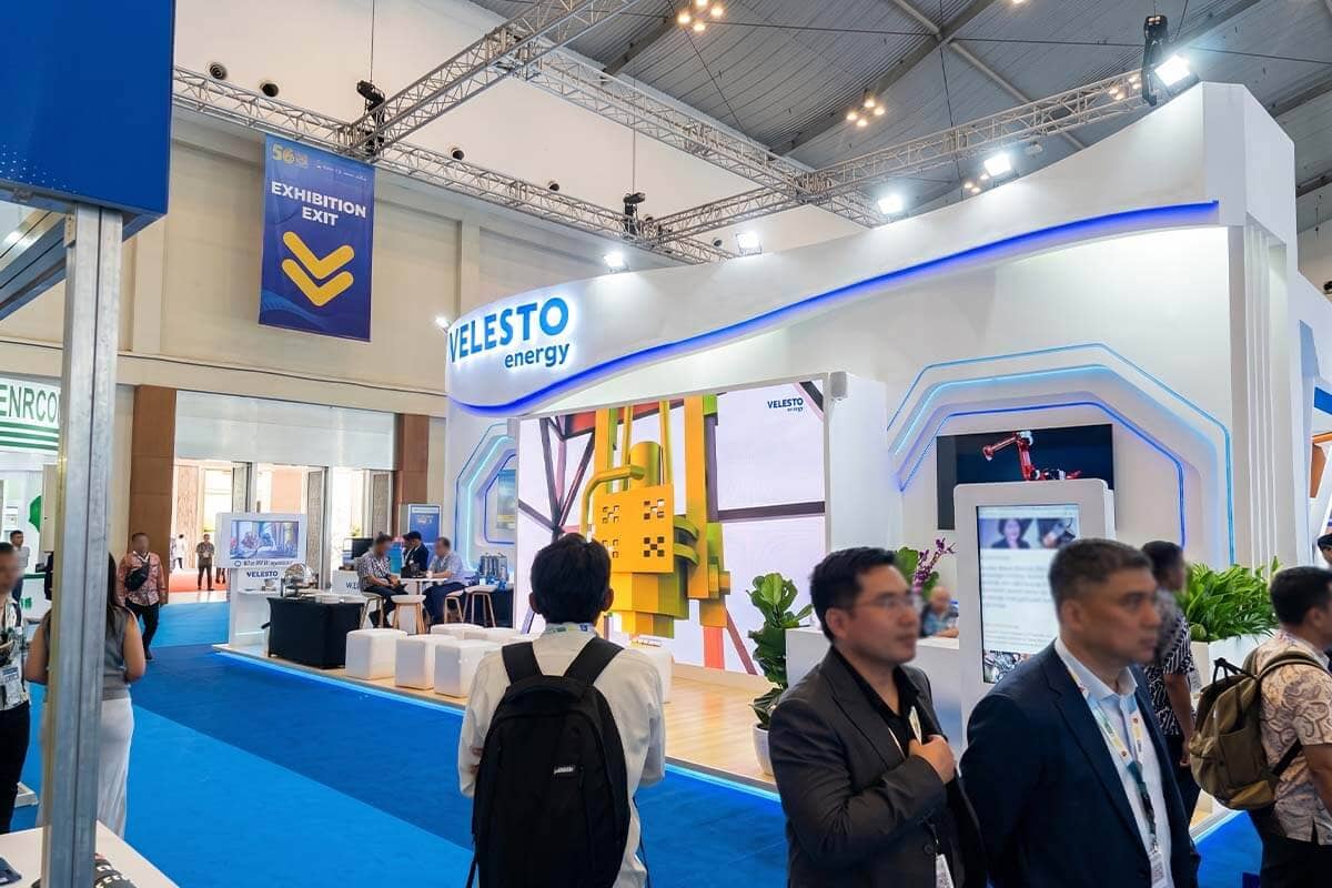 Velesto Energy booth — branded panel detail